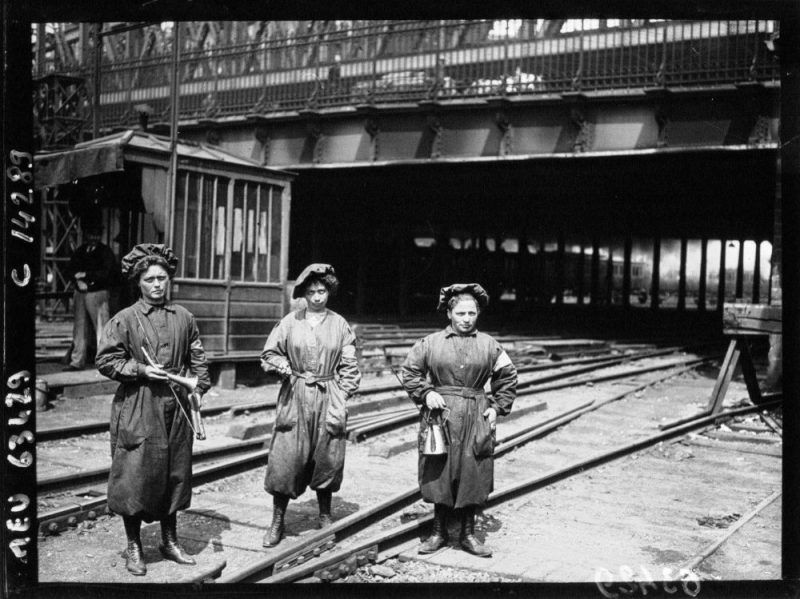 Women grease and inspect the signals Gare du Nord Paris France