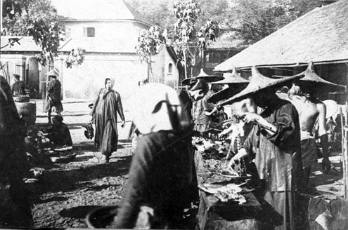 At a market (1890)