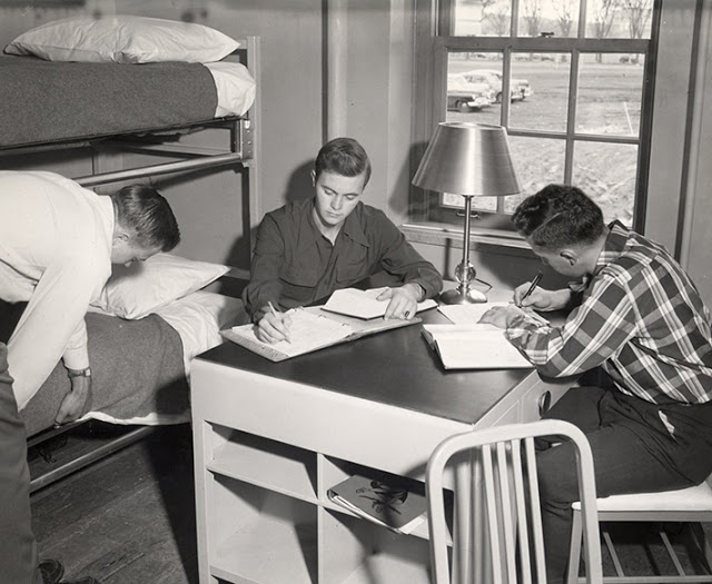 Students studied around a communal table, ca. 1950s.