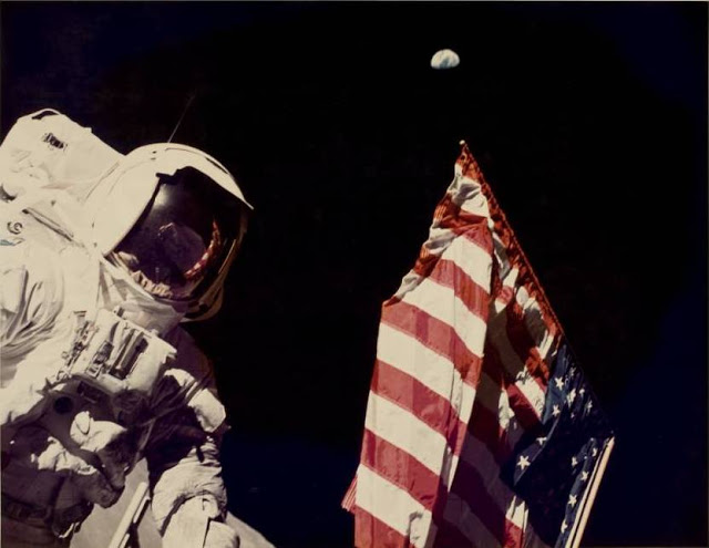 Schmitt with flag and earth above, December 13, 1972