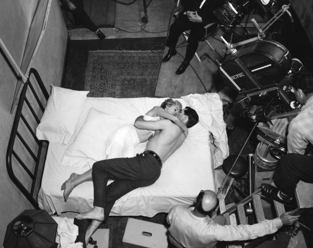 anet Leigh and John Gavin share an intimate moment with at least four other people and tons of equipment in Psycho (1960).