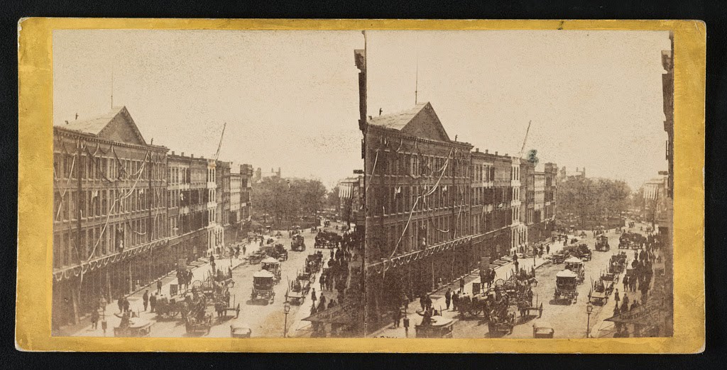 An aerial view of buildings on Broadway draped with mourning cloth in preparation for Abraham Lincoln's funeral procession, April 24, 1865.
