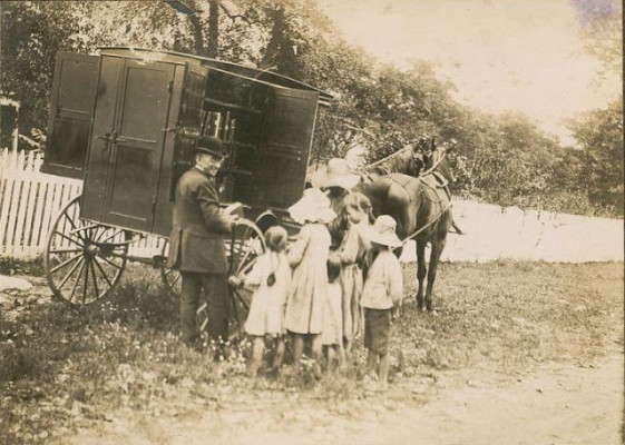 A very old library bookmobile of America, ca. 1900s