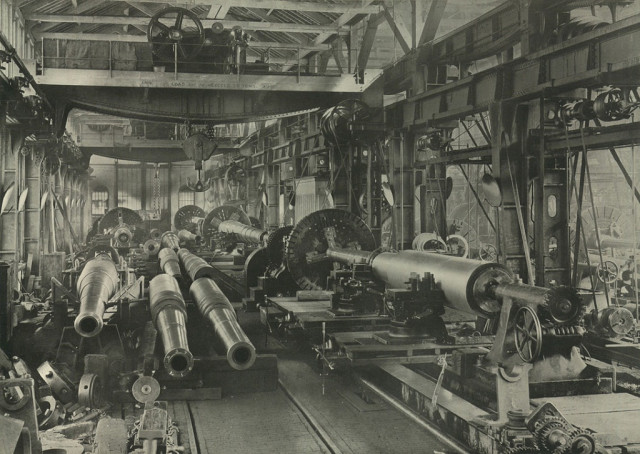 View inside the Heavy Gun Machine Shop at the Elswick Works, Newcastle upon Tyne, c1900 (TWAM ref. 5484). This image shows 8”, 9.2” and 12” guns being machined.
