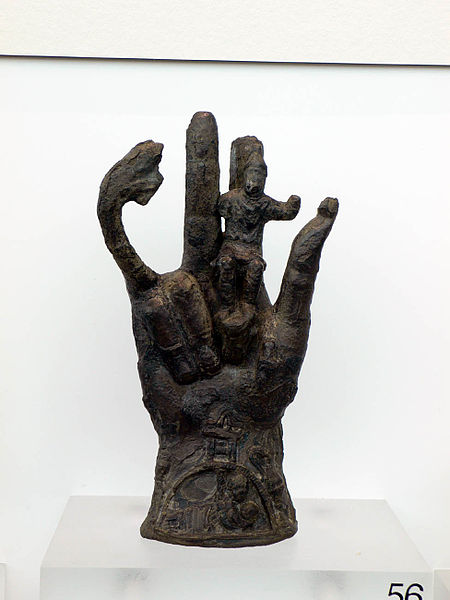 Larger examples of the Hand of Sabazius often bear a pinecone on the tip of the snake-nose “thumb,” and occasionally a miniature Sabazius cradled between the palm and fingers. source