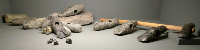 Axe heads found at a 2700 BC Neolithic manufacture site in Switzerland, arranged in the various stages of production from left to right. Click to see individual images.