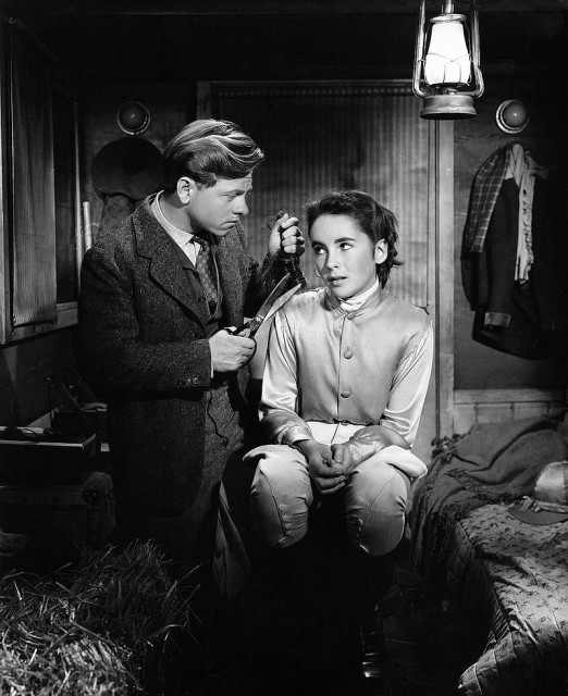 Taylor with co-star Mickey Rooney in National Velvet (1944), her first major film role.Source