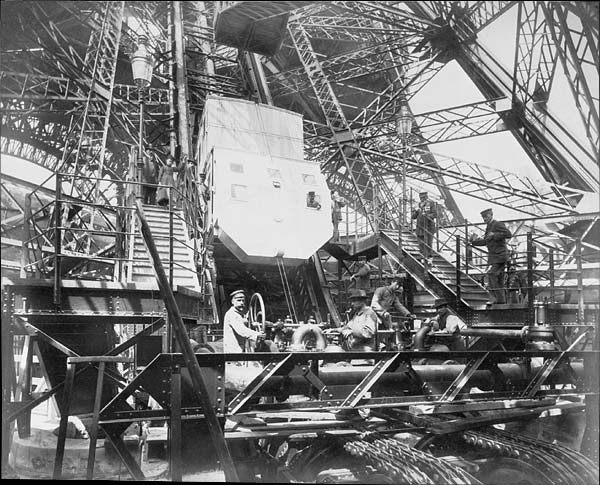 The Roux, Combaluzier & Lepape lifts during construction. Note the drive sprockets and chain in the foreground.Source