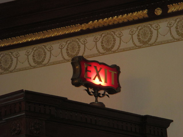 Exit sign at Club 33 at Disneyland.Source