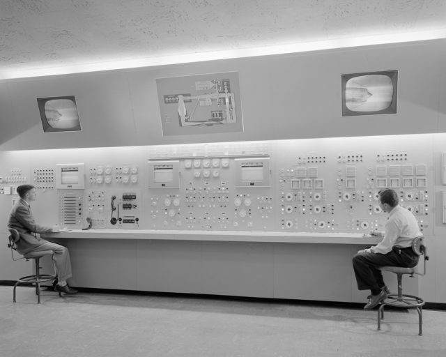 One of three control panels in the control room of the Lewis Unitary Plan Wind Tunnel. The tunnel model (top center) shows position of the valves that control the operating cycle of the tunnel. The TV monitor screens can be connected to any of 3 closed-circuit TV cameras used to monitor tunnel components.