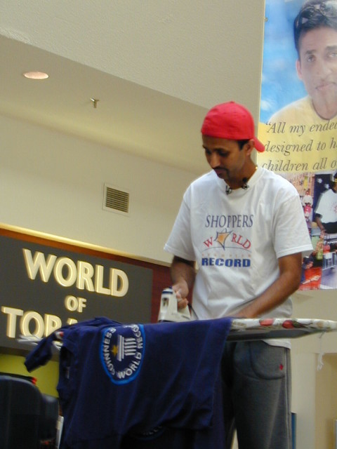 Suresh Joachim, minutes away from breaking the ironing world record at 55 hours and 5 minutes, at Shoppers World Brampton. Source