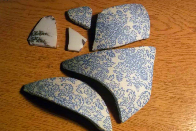 Broken pieces of the ceramic vase