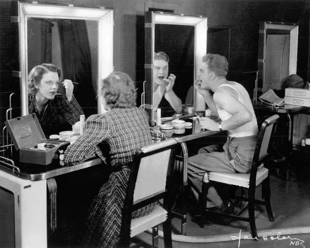 Albert and Grace Bradt applying makeup for their first TV .appearance, November 1936.Source