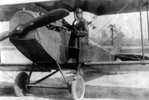 Bessie Coleman and her plane 1922