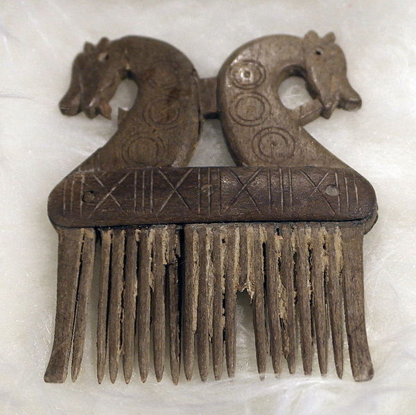Bone comb with two heads of horses from the Carolingian period (750-900) found in the river Scheldt, now in the archeological museum of Hamme, Belgium. Source