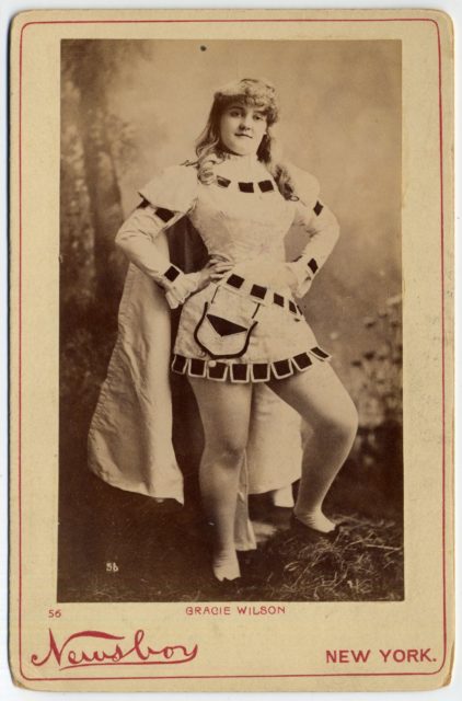 Gracie Wilson in costume with a cape.
