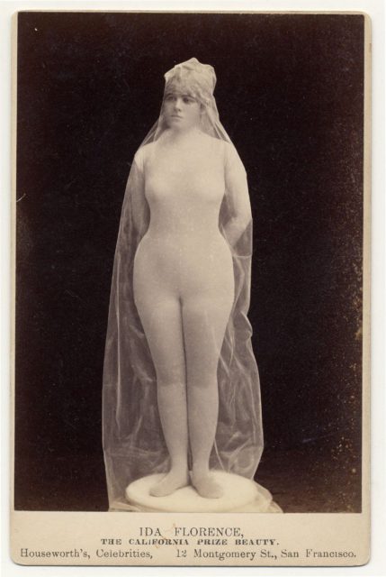Ida Florence, The California Prize Beauty, in body stocking covered with transparent fabric, posed as statue.