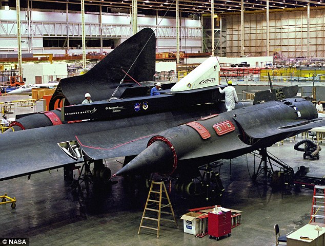 Lockheed engineers working on the Blackbird - the dark colour acts as a camouflage.Source:NASA