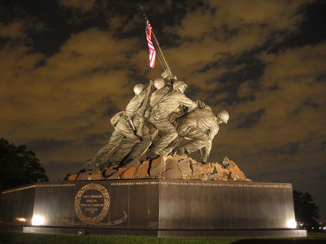 USMC War Memorial, which depicts the flag-raising on Iwo Jima. The memorial is modeled on Joe Rosenthal's famous Raising the Flag on Iwo Jima. source