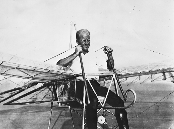 George R. White on the beach at St. Augustine where he attempted to make the first successful bird-like flight in history. Source