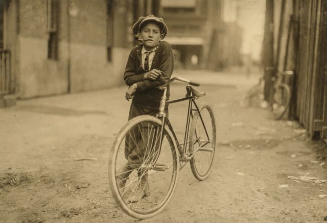 Messenger boy working for Mackay Telegraph Company. Said fifteen years old. Exposed to Red Light dangers.