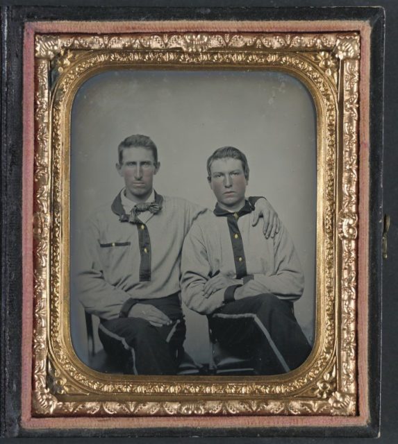 Unidentified soldiers in Confederate battle shirts.
