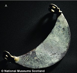 A lunate/crescent-shaped pendant with two double-loops, shown left, and silver hemispheres shown right. Source National Museum Scotland