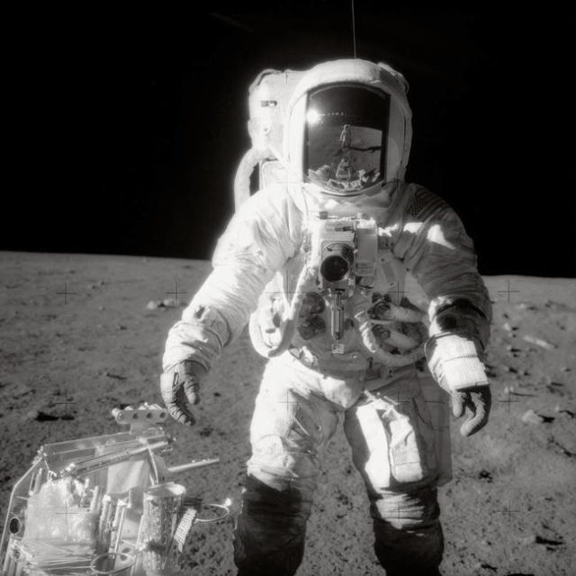 Alan L. Bean, posing next to a moon-friendly toolbox during the Apollo 12 landing.