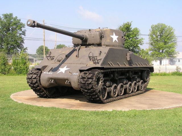 An M4A3E8 Sherman tank, the same model as Besotten Jenny, displayed at the former Patton Museum of Cavalry and Armor (2008) By BonesBrigade at en.wikipedia, CC BY-SA 3.0, https://commons.wikimedia.org/w/index.php?curid=7677157