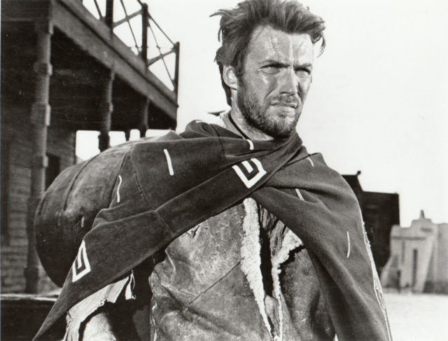 As the Man with No Name in A Fistful of Dollars (1964) Source