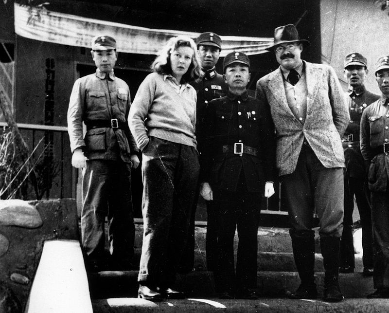 Hemingway with his third wife Martha Gellhorn, posing with General Yu Hanmou, Chungking, China, 1941