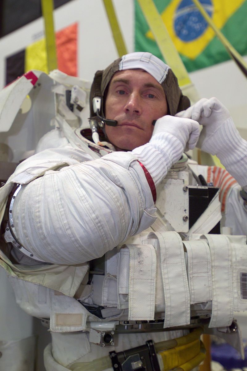 Expedition 11 Commander Sergei Krikalev dons a training space suit