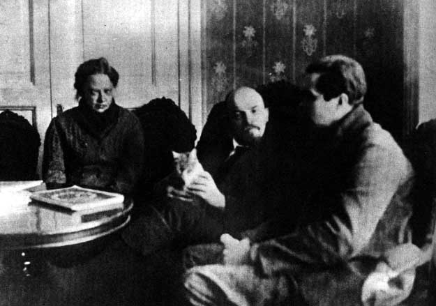 Nadezhda Krupskaya, Lenin, Lenin's cat, and an American journalist in the Kremlin, 1920.