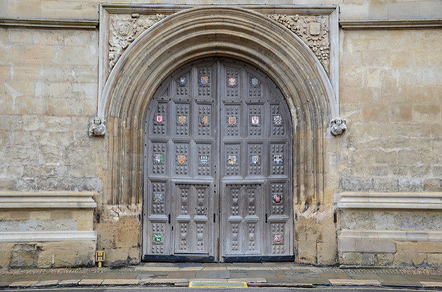 Library's entrance with the coast-of-arms of several Oxford colleges. Image by- Paul Hayday.Flickr.CC BY 2.0