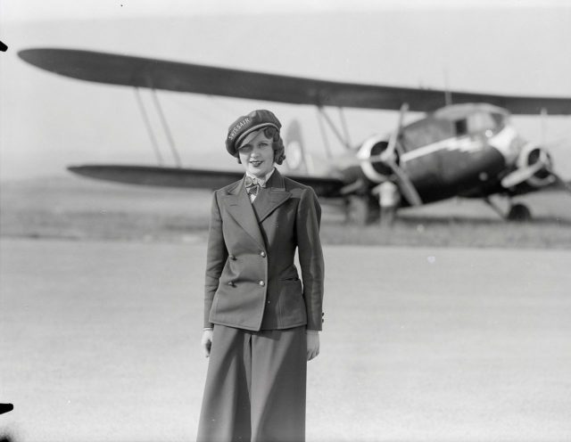 Nelly Diener, the first air stewardess in Europe, in 1934. She died later that year. By Swissair - ETH-Bibliothek Zürich, Bildarchiv/Stiftung Luftbild Schweiz / Fotograf: Swissair / LBS_SR02-10664 / CC BY-SA 4.0, CC BY-SA 4.0, https://commons.wikimedia.org/w/index.php?curid=48924693