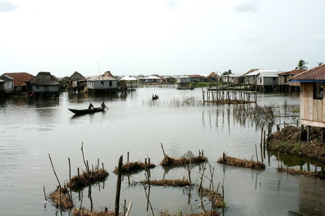 The entire village stands on slits in the middle of the lake. Photo Credit