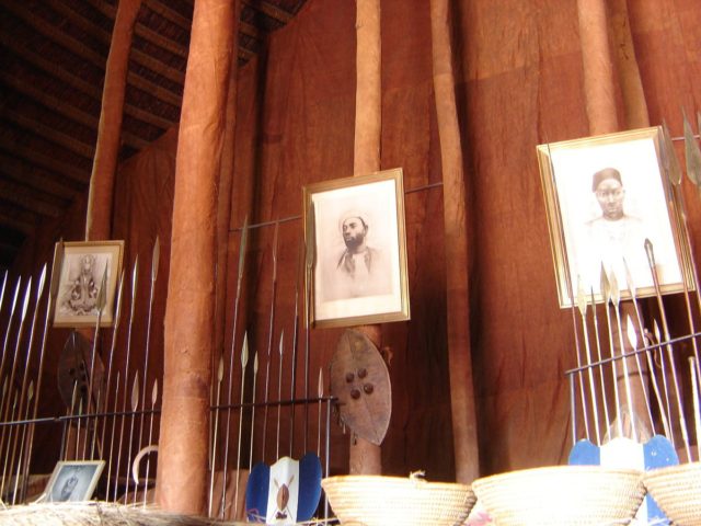 The interior of the Muzibu Azaala Mpanga in 2007, included relics and portraits of the buried kabakas. By not not phil CC BY-SA 2.0