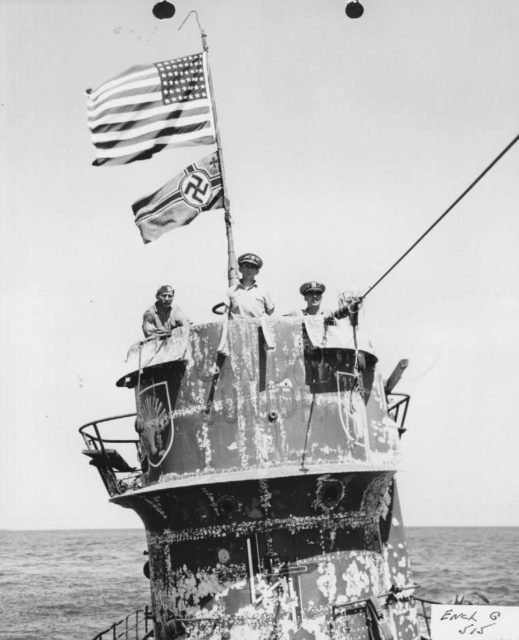 Left to right: Commander Trosino, Captain Gallery, and Lt.(jg) David on the bridge of U-505.