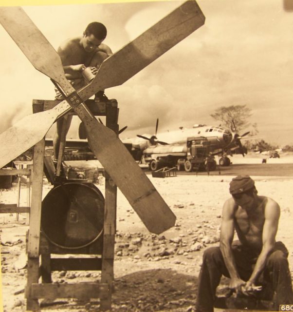 On wash day at North Field on Guam, Marianas Islands,homemade washing machine driven by rotating propeller. (NARA)