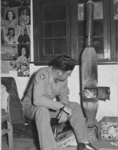 Captain Everett Baker of the Assam Dragon squadron in China had some hot glamour pin-up photos, but for the really cold nights he welded a stove from an empty bomb shell and scrap tin and I bet, if these were on the market today they would sell (NARA)