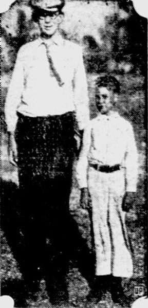  "Robert Wadlow (left) and Jack Grissom, playmates at Alton, IL, are both 10 years old. Robert is six feet, six inches tall and weights 211 pounds. Jack is four feet, two inches-about normal for a boy of his age."