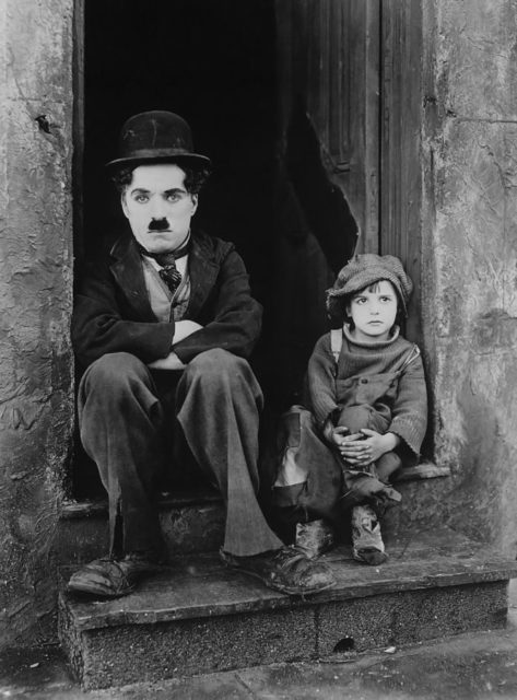 Charlie Chaplin and Jackie Coogan in "The Kid".
