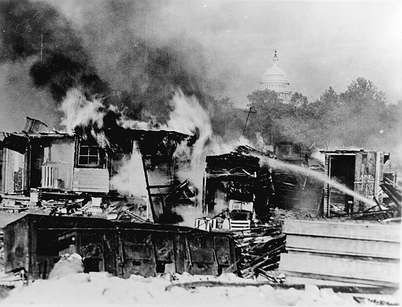 Shacks, erected by the Bonus Army on the Anacostia flats, burning after being set on fire by the US military (1932)