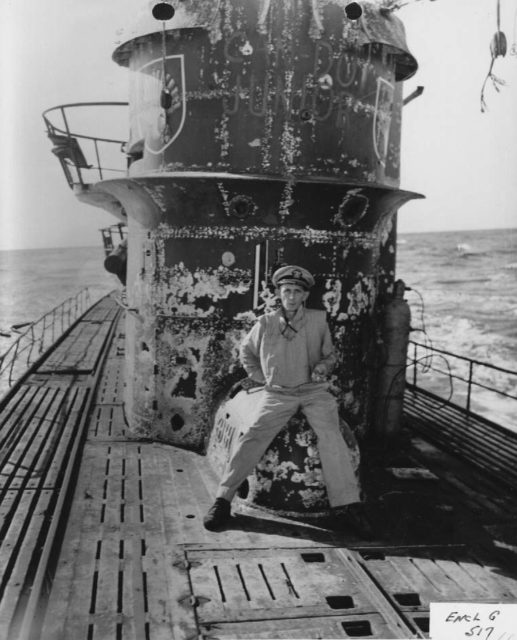 Captain Gallery in front of the conning tower of “Junior”, U-505.