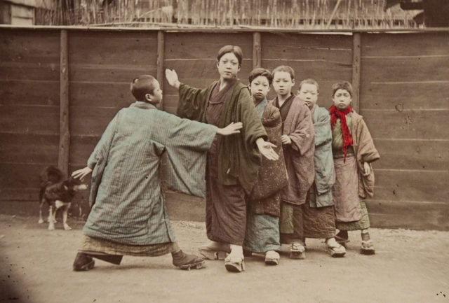 Boys playing kotoro 1890
