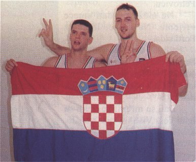 Petrović and Dino Rađa, holding the flag of Croatia. Photo Credit
