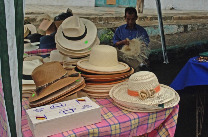 A vendor in Montecristi selling hats. Photo Credit