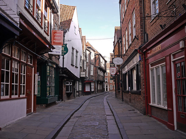 The Shambles gives a sense of the medieval town where buildings leaned toward each other across narrow streets. Photo Credit