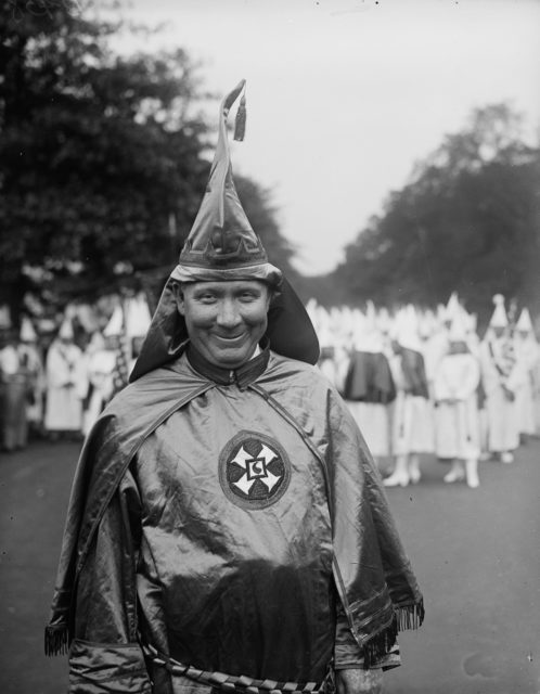 Dr. H.W. Evans, Imperial Wizard of the Ku Klux Klan, walks in the parade. 