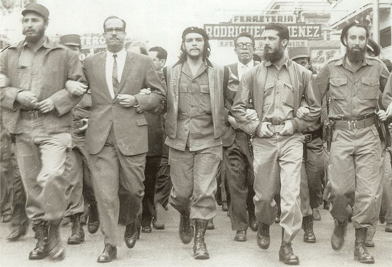 Castro (far left), Che Guevara (center), and other leading revolutionaries, marching through the streets in protest at the La Coubre explosion, March 5, 1960